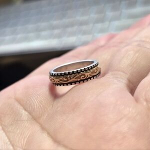 14k gold and sterling scroll design ring 
Size 5
